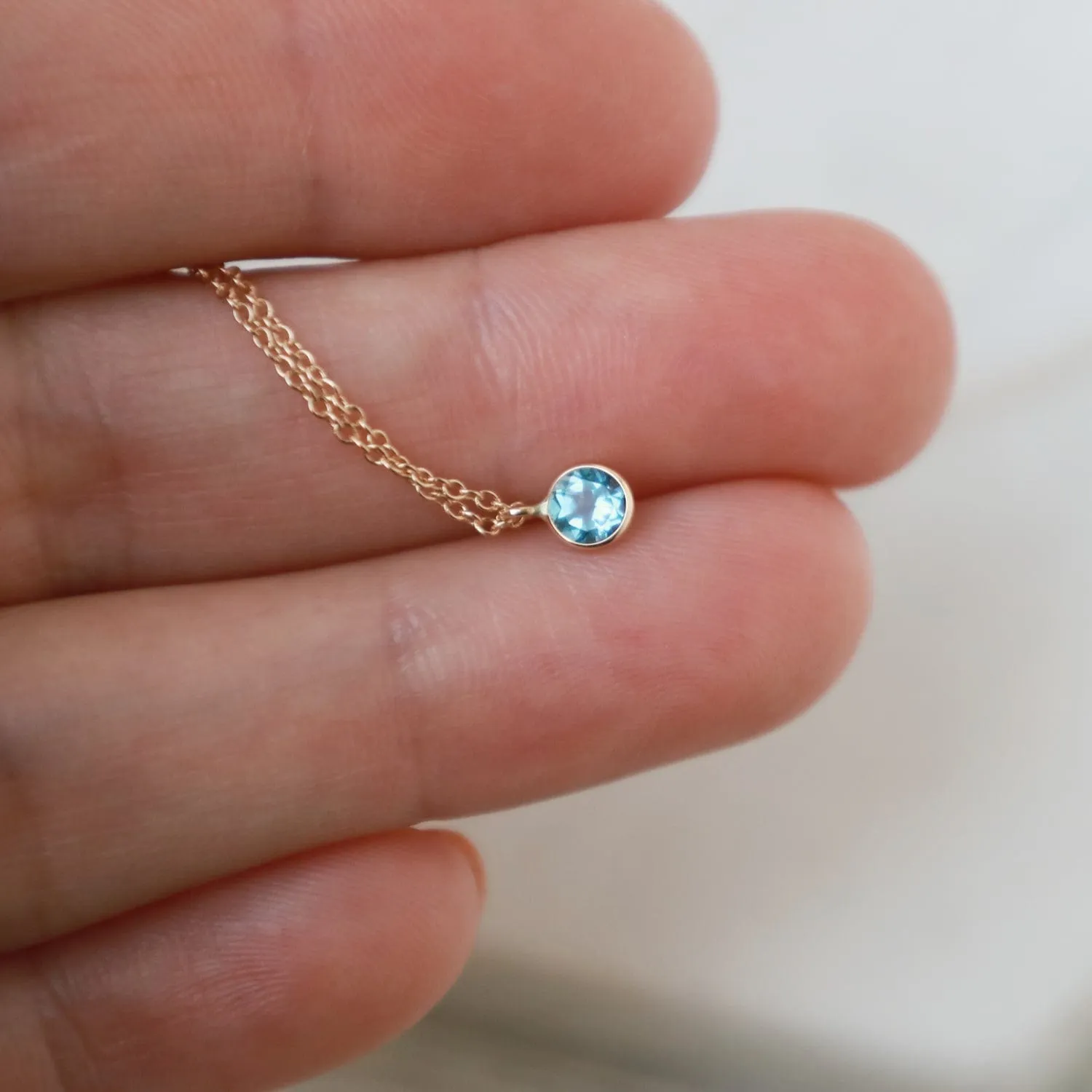 Yellow Gold & Dark Blue Topaz Solitaire Necklace
