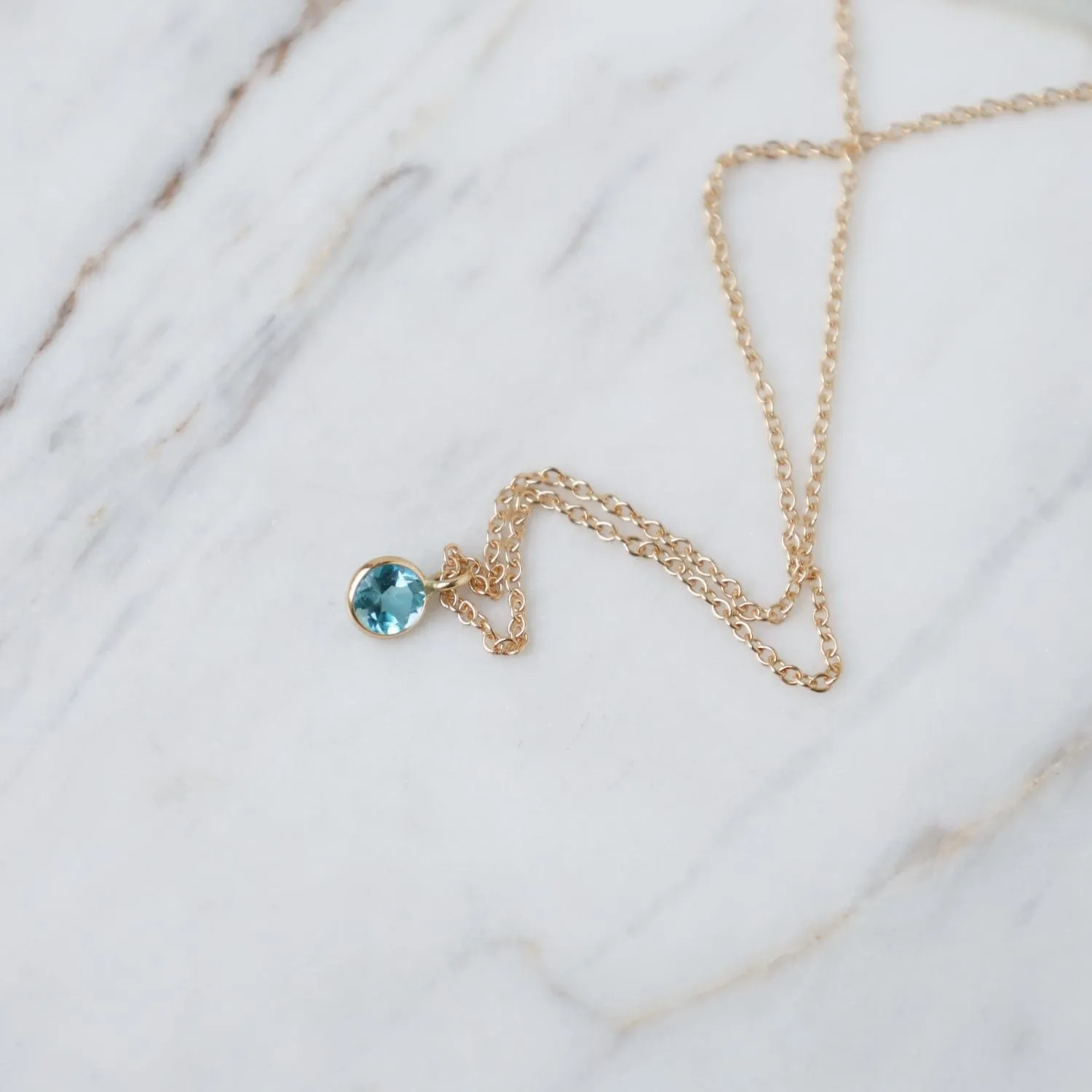 Yellow Gold & Dark Blue Topaz Solitaire Necklace